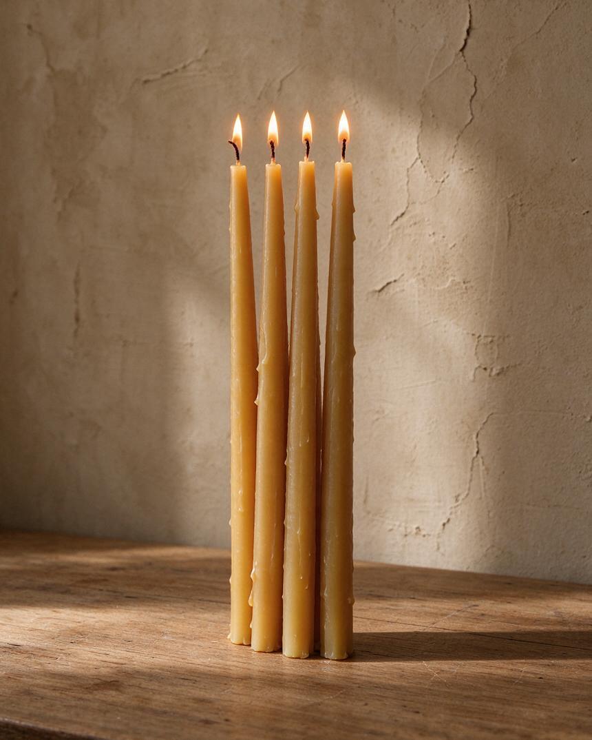 Four beeswax taper candles